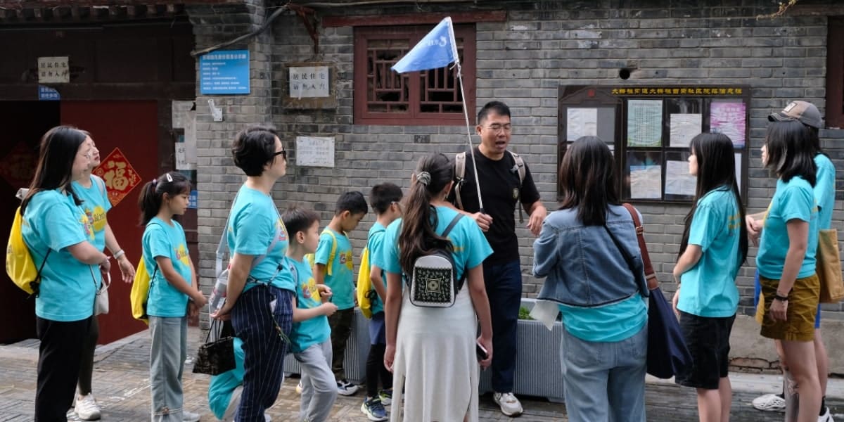 Professional teacher helping student with Chinese learning