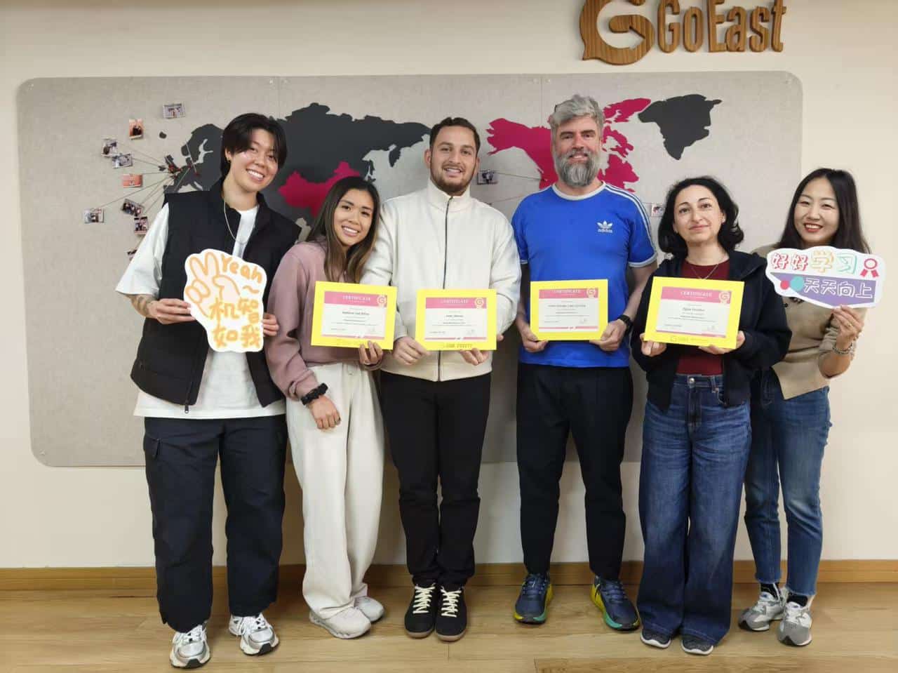 Celebrating progress with classmates at GoEast Mandarin